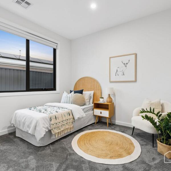 Children’s bedroom with contemporary décor and spacious layout in a custom new home Geelong
